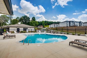 the preserve at ballantyne commons resort style swimming pool with patio furniture